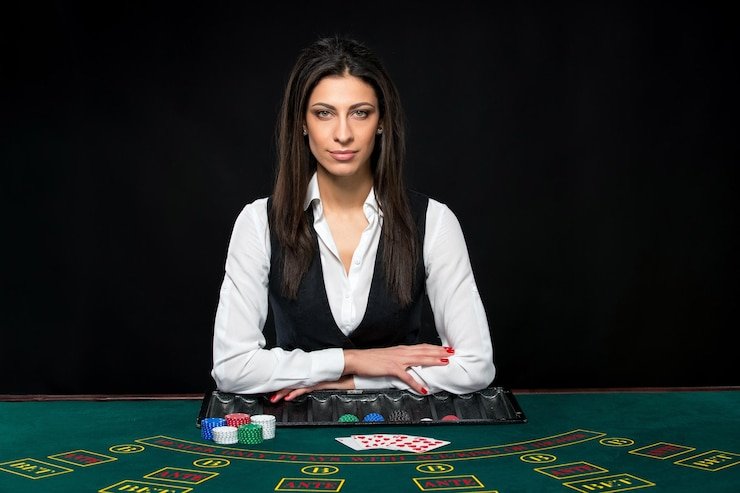 Live roulette table interface on nx303 slot showing dealer, wheel, betting zones, and chat panel